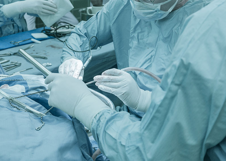 dr. neil cochrane performing brain surgery